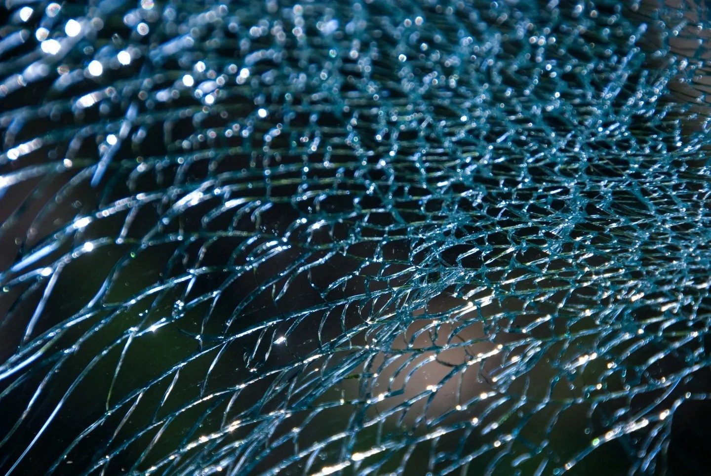 Auto glass technician at work